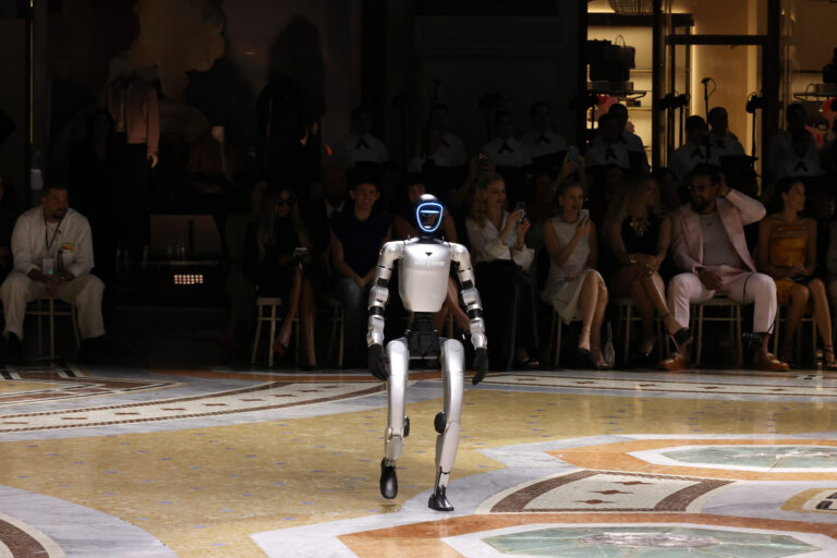 Unitree robot walks the runway during Vogue World: Milano 2026 at Galleria Vittorio Emanuele II